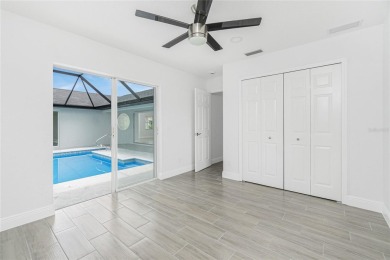 Fully Renovated Pool Home - No HOA, No Flood Insurance Required on Lemon Bay Golf Club in Florida - for sale on GolfHomes.com, golf home, golf lot
