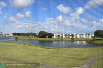 PENTHOUSE APT. GORGEOUS WATER AND GOLF VIEWS. 1 BEDROOM 1 1/2 on Wynmoor Golf Course in Florida - for sale on GolfHomes.com, golf home, golf lot
