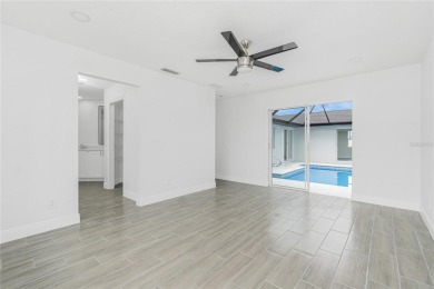 Fully Renovated Pool Home - No HOA, No Flood Insurance Required on Lemon Bay Golf Club in Florida - for sale on GolfHomes.com, golf home, golf lot