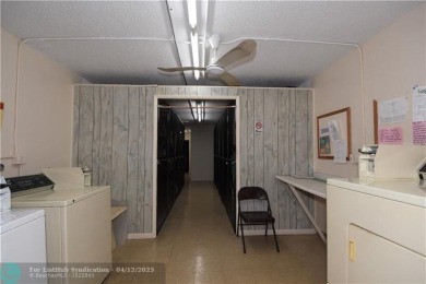 PENTHOUSE APT. GORGEOUS WATER AND GOLF VIEWS. 1 BEDROOM 1 1/2 on Wynmoor Golf Course in Florida - for sale on GolfHomes.com, golf home, golf lot