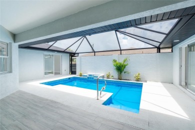 Fully Renovated Pool Home - No HOA, No Flood Insurance Required on Lemon Bay Golf Club in Florida - for sale on GolfHomes.com, golf home, golf lot