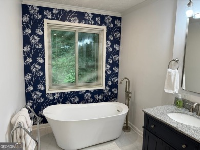 Best location in Peachtree City with access to golf cart trails on Canongate At Flat Creek Club in Georgia - for sale on GolfHomes.com, golf home, golf lot