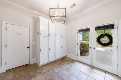 Discover this exceptional estate home in the prestigious COUNTRY on Country Club of the South in Georgia - for sale on GolfHomes.com, golf home, golf lot