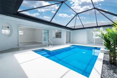 Fully Renovated Pool Home - No HOA, No Flood Insurance Required on Lemon Bay Golf Club in Florida - for sale on GolfHomes.com, golf home, golf lot