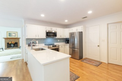 Best location in Peachtree City with access to golf cart trails on Canongate At Flat Creek Club in Georgia - for sale on GolfHomes.com, golf home, golf lot