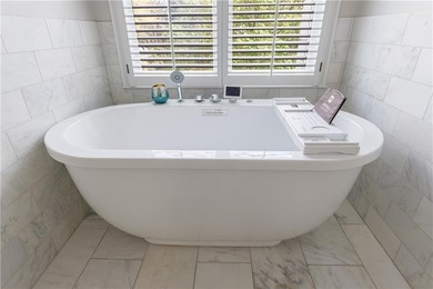 Discover this exceptional estate home in the prestigious COUNTRY on Country Club of the South in Georgia - for sale on GolfHomes.com, golf home, golf lot