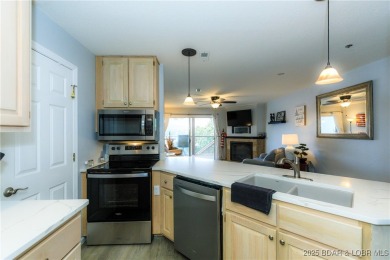 Welcome to your lake escape! This beautiful, first floor, 3-bed on Bear Creek Valley Golf Club in Missouri - for sale on GolfHomes.com, golf home, golf lot