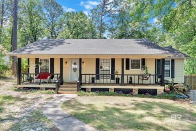 Welcome home to this charming single story 4 bedroom 2 bathroom on Lake Forest Yacht and Country Club in Alabama - for sale on GolfHomes.com, golf home, golf lot