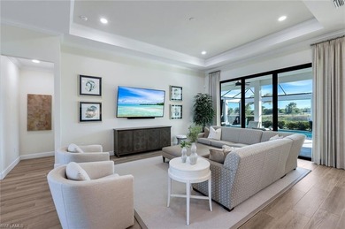 Sophisticated, serene, contemporary, and warm, this absolutely on The Golf Club At Fiddlers Creek in Florida - for sale on GolfHomes.com, golf home, golf lot