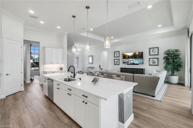 Sophisticated, serene, contemporary, and warm, this absolutely on The Golf Club At Fiddlers Creek in Florida - for sale on GolfHomes.com, golf home, golf lot