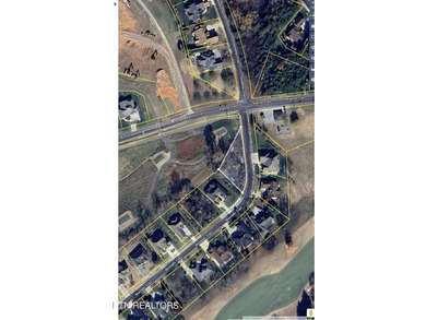 Beautiful level lot located right on the golf course in the on Tellico Village -The Links At Kahite Golf Course in Tennessee - for sale on GolfHomes.com, golf home, golf lot