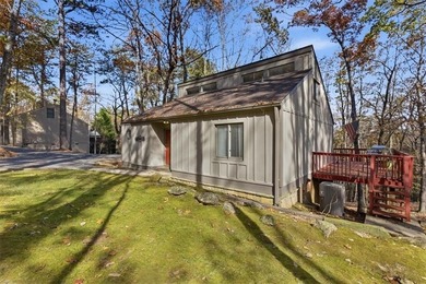 Welcome to 106 Lake Cottages Court -- a warm, charming retreat on The Highlands Course at Lake Arrowhead in Georgia - for sale on GolfHomes.com, golf home, golf lot