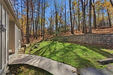 Welcome to 106 Lake Cottages Court -- a warm, charming retreat on The Highlands Course at Lake Arrowhead in Georgia - for sale on GolfHomes.com, golf home, golf lot