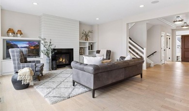 Experience modern luxury in this stunning custom-built Gonyea on Rush Creek Golf Club in Minnesota - for sale on GolfHomes.com, golf home, golf lot