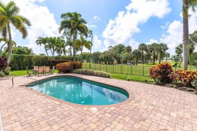 This thoughtfully cared for home offers 3 spacious bedrooms on Atlantis Golf Club in Florida - for sale on GolfHomes.com, golf home, golf lot