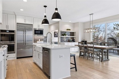 Experience modern luxury in this stunning custom-built Gonyea on Rush Creek Golf Club in Minnesota - for sale on GolfHomes.com, golf home, golf lot