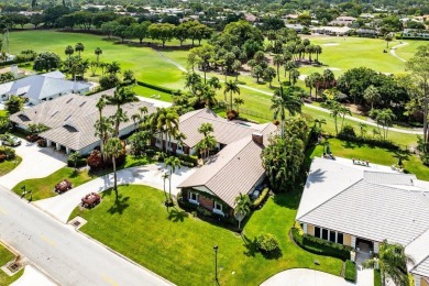 This thoughtfully cared for home offers 3 spacious bedrooms on Atlantis Golf Club in Florida - for sale on GolfHomes.com, golf home, golf lot