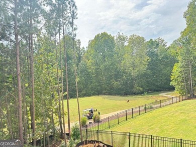 Exquisite Golf Course Retreat! Nestled on the pristine 3rd on Traditions of Braselton Golf Club in Georgia - for sale on GolfHomes.com, golf home, golf lot