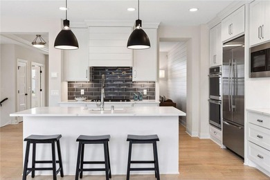 Experience modern luxury in this stunning custom-built Gonyea on Rush Creek Golf Club in Minnesota - for sale on GolfHomes.com, golf home, golf lot