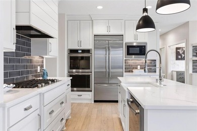 Experience modern luxury in this stunning custom-built Gonyea on Rush Creek Golf Club in Minnesota - for sale on GolfHomes.com, golf home, golf lot