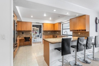 This thoughtfully cared for home offers 3 spacious bedrooms on Atlantis Golf Club in Florida - for sale on GolfHomes.com, golf home, golf lot