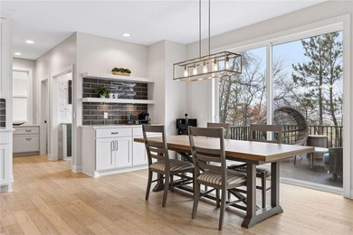 Experience modern luxury in this stunning custom-built Gonyea on Rush Creek Golf Club in Minnesota - for sale on GolfHomes.com, golf home, golf lot