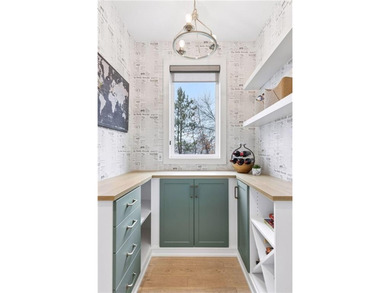 Experience modern luxury in this stunning custom-built Gonyea on Rush Creek Golf Club in Minnesota - for sale on GolfHomes.com, golf home, golf lot