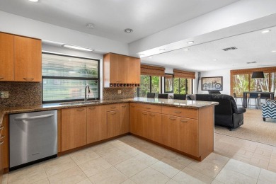 This thoughtfully cared for home offers 3 spacious bedrooms on Atlantis Golf Club in Florida - for sale on GolfHomes.com, golf home, golf lot