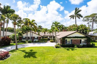 This thoughtfully cared for home offers 3 spacious bedrooms on Atlantis Golf Club in Florida - for sale on GolfHomes.com, golf home, golf lot