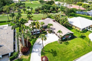 This thoughtfully cared for home offers 3 spacious bedrooms on Atlantis Golf Club in Florida - for sale on GolfHomes.com, golf home, golf lot