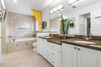 This thoughtfully cared for home offers 3 spacious bedrooms on Atlantis Golf Club in Florida - for sale on GolfHomes.com, golf home, golf lot