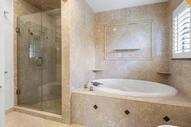 This thoughtfully cared for home offers 3 spacious bedrooms on Atlantis Golf Club in Florida - for sale on GolfHomes.com, golf home, golf lot