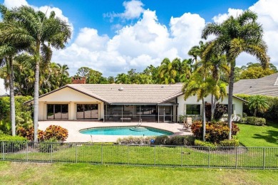 This thoughtfully cared for home offers 3 spacious bedrooms on Atlantis Golf Club in Florida - for sale on GolfHomes.com, golf home, golf lot