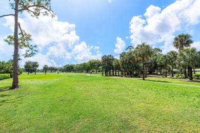 This thoughtfully cared for home offers 3 spacious bedrooms on Atlantis Golf Club in Florida - for sale on GolfHomes.com, golf home, golf lot