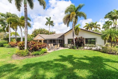 This thoughtfully cared for home offers 3 spacious bedrooms on Atlantis Golf Club in Florida - for sale on GolfHomes.com, golf home, golf lot
