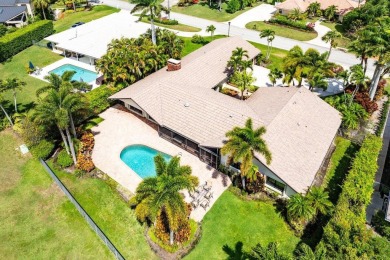 This thoughtfully cared for home offers 3 spacious bedrooms on Atlantis Golf Club in Florida - for sale on GolfHomes.com, golf home, golf lot