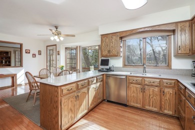 Step into this stunning 5-bedroom, 2.5-bath home, perfectly on Carriage Greens Country Club in Illinois - for sale on GolfHomes.com, golf home, golf lot