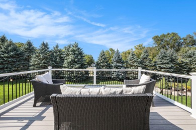 Welcome to this stunning 4-bedroom, 4-bathroom home situated on on Boulder Creek Golf Club in Michigan - for sale on GolfHomes.com, golf home, golf lot