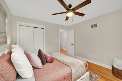 At first glance, this brick and sided split-level home may on Ravisloe Country Club in Illinois - for sale on GolfHomes.com, golf home, golf lot
