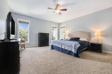 Welcome to this stunning 4-bedroom, 4-bathroom home situated on on Boulder Creek Golf Club in Michigan - for sale on GolfHomes.com, golf home, golf lot
