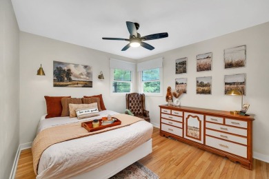At first glance, this brick and sided split-level home may on Ravisloe Country Club in Illinois - for sale on GolfHomes.com, golf home, golf lot