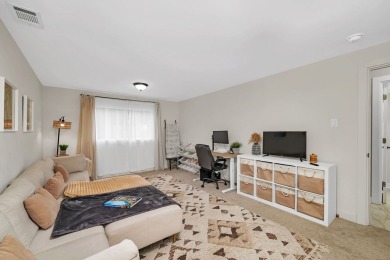 At first glance, this brick and sided split-level home may on Ravisloe Country Club in Illinois - for sale on GolfHomes.com, golf home, golf lot