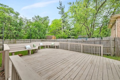At first glance, this brick and sided split-level home may on Ravisloe Country Club in Illinois - for sale on GolfHomes.com, golf home, golf lot