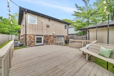 At first glance, this brick and sided split-level home may on Ravisloe Country Club in Illinois - for sale on GolfHomes.com, golf home, golf lot