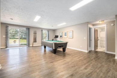 Welcome to this stunning 4-bedroom, 4-bathroom home situated on on Boulder Creek Golf Club in Michigan - for sale on GolfHomes.com, golf home, golf lot