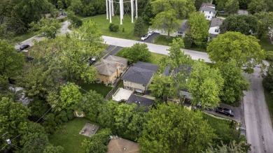At first glance, this brick and sided split-level home may on Ravisloe Country Club in Illinois - for sale on GolfHomes.com, golf home, golf lot