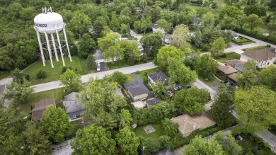 At first glance, this brick and sided split-level home may on Ravisloe Country Club in Illinois - for sale on GolfHomes.com, golf home, golf lot