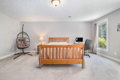 Welcome to this stunning 4-bedroom, 4-bathroom home situated on on Boulder Creek Golf Club in Michigan - for sale on GolfHomes.com, golf home, golf lot