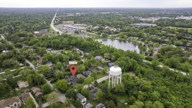 At first glance, this brick and sided split-level home may on Ravisloe Country Club in Illinois - for sale on GolfHomes.com, golf home, golf lot