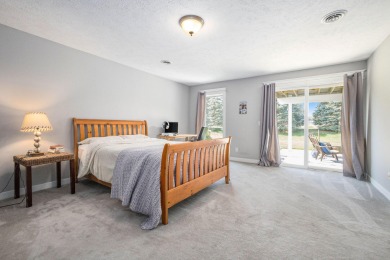 Welcome to this stunning 4-bedroom, 4-bathroom home situated on on Boulder Creek Golf Club in Michigan - for sale on GolfHomes.com, golf home, golf lot